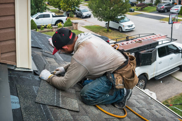 Professional Roofing technician working in Topeka, IN